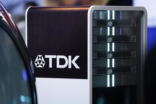 The TDK Corp. logo displayed on the company's industrial standard battery unit at the Combined Exhibition of Advanced Technologies (Ceatec) in Chiba, Japan, on Tuesday, Oct. 17, 2023. Ceatec, the annual information technology and electronics trade show, will run through Oct. 20.
