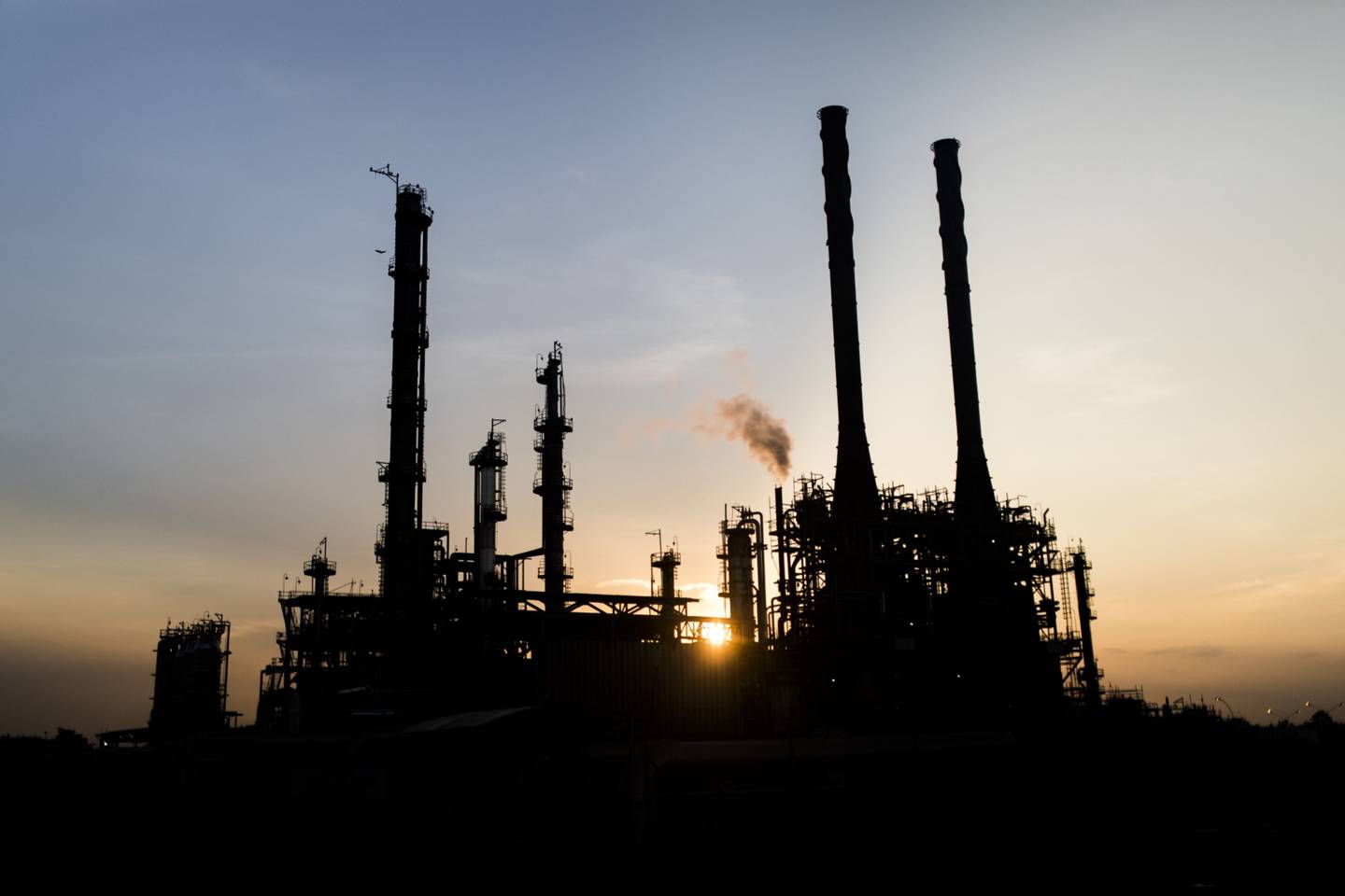 Sunset at the Ecopetrol Barrancabermeja refinery in Barrancabermeja, Colombia, on Tuesday, Feb. 15, 2022. Ecopetrol says it expects organic investments in the range of $17b-$20b for 2022-2024 , of which 69% is expected to be for upstream projects. Photographer: Ivan Valencia/Bloomberg