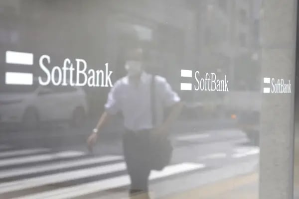 The SoftBank Corp. logo is displayed on a store window in Tokyo, Japan, on Friday, May 15, 2020