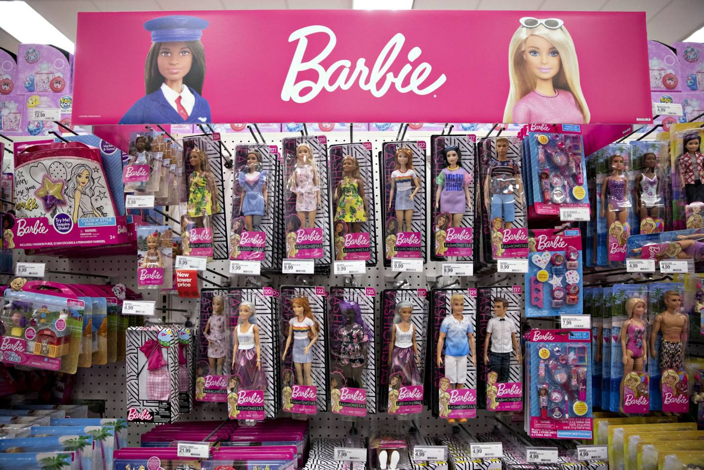 Mattel Inc. Barbie brand dolls hang on display at a Target Corp. store in Chicago, Illinois, U.S., on Saturday, Nov. 16, 2019. Target Corp. is scheduled to release earnings figures on November 20. Photographer: Daniel Acker/Bloombergdfd