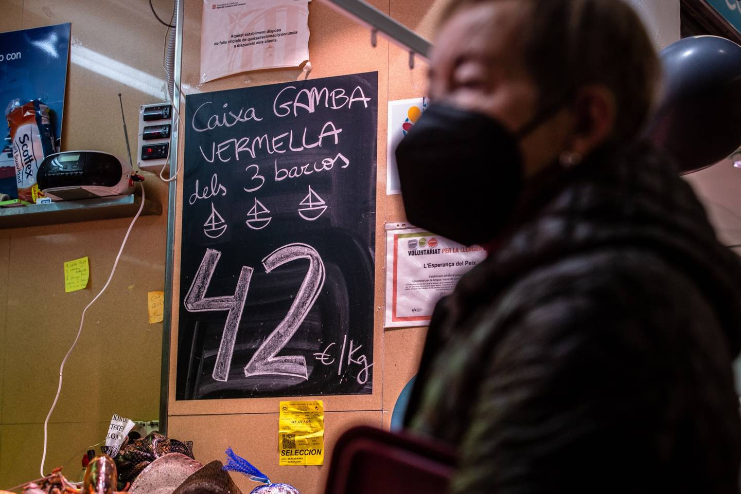 Euro price per kilo information on a fresh fish stall at a food market in the Molins de Re district of Barcelona, Spain, on Friday, Dec. 10, 2021.