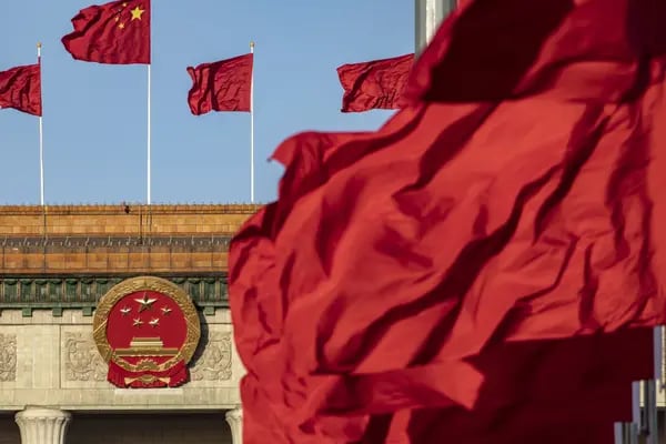 Chinese national flags fly over Tiananmen Square along with other red flags ahead of the fifth plenary session of the First Session of the 14th National People's Congress (NPC) at the Great Hall of the People in Beijing, China, on Sunday, March 12, 2023. China reappointed several top economic officials in a leadership reshuffle Sunday, giving investors greater continuity as Beijing overhauls financial regulation and grapples with escalating tensions with the US. Photographer: Qilai Shen/Bloomberg