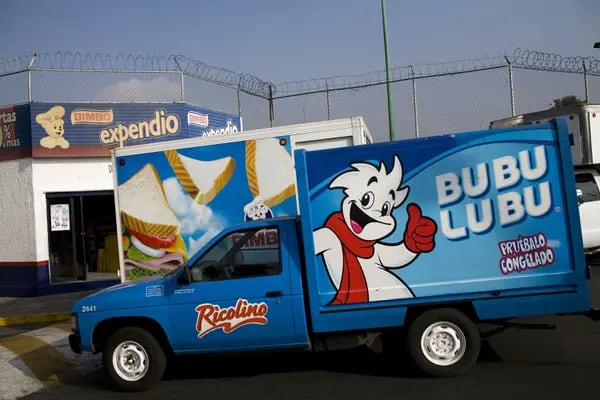 A snack cake delivery truck is parked in front of a Grupo Bimbo SA factory in Mexico City, Mexico.on Tuesday, Oct. 20, 2009  Large companies like Bimbo provide a significant part of the tax base in Mexico. Photographer: David Rochkind/Bloomberg
