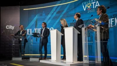 Gustavo Petro, the left-wing presidential candidate leading the polls for the Colombia Humana party (left), with Federico Gutiérrez, candidate for the Creemos (second from left), and Sergio Fajardo, the Coalición Centro Esperanza canidate (far right), during a debate in Bogotá on May 23, 2022.