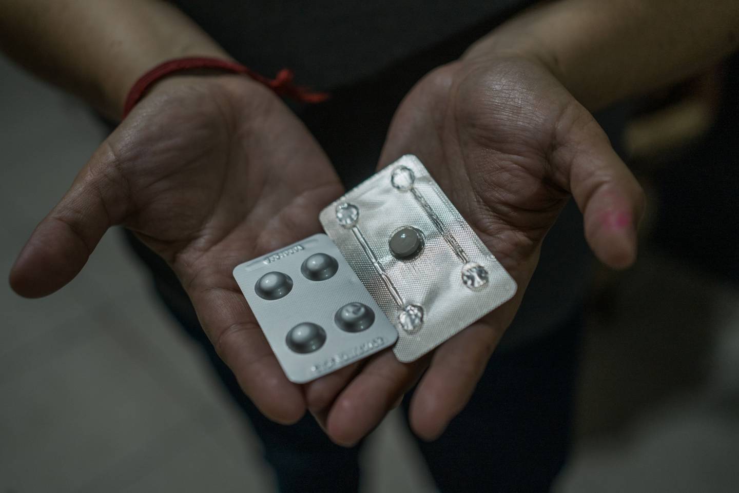 Jimenez holds abortion medications.  Photographer: Victoria Razo/Bloombergdfd