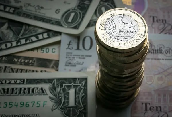 BATH, ENGLAND - OCTOBER 13: In this photo illustration, a stack of £1 coins is seen with the new £10 note alongside euro notes and US dollar bills on October 13, 2017 in Bath, England. Currency experts have warned that as the uncertainty surrounding Brexit continues, the value of the British pound, which has remained depressed against the US dollar and the euro since the UK voted to leave in the EU referendum, is likely to fluctuate. (Photo Illustration by Matt Cardy/Getty Images)