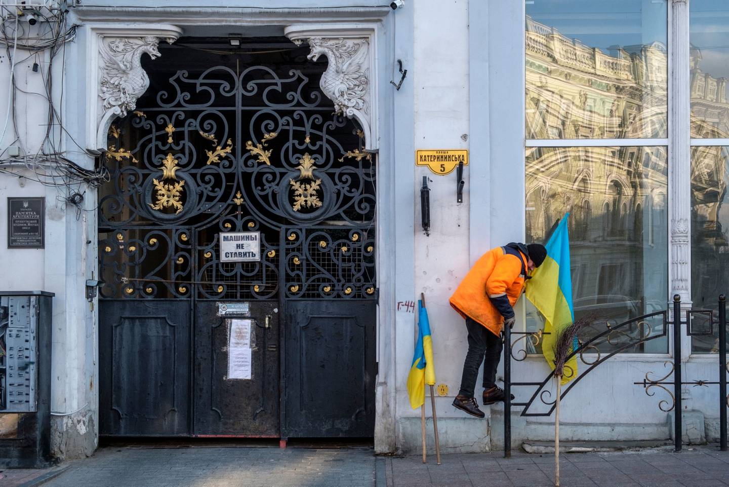 Ukrainian flags are installed outside a building in Odessa. The city's confidence extends to a belief that Ukraine could stop it falling into Russian hands.dfd