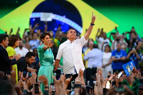 O presidente Jair Bolsonaro com a primeira-dama Michelle no evento de lançamento de sua candidatura à reeleição, em agosto de 2022