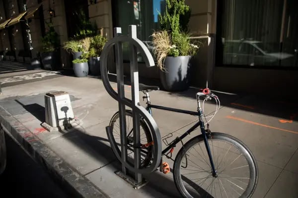 A money sign bike stand near the New York Stock Exchange.