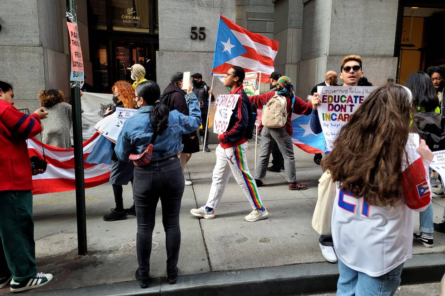 Protestors gather outside a Puerto Rico investor conference in lower Manhattan on May 18. 
dfd