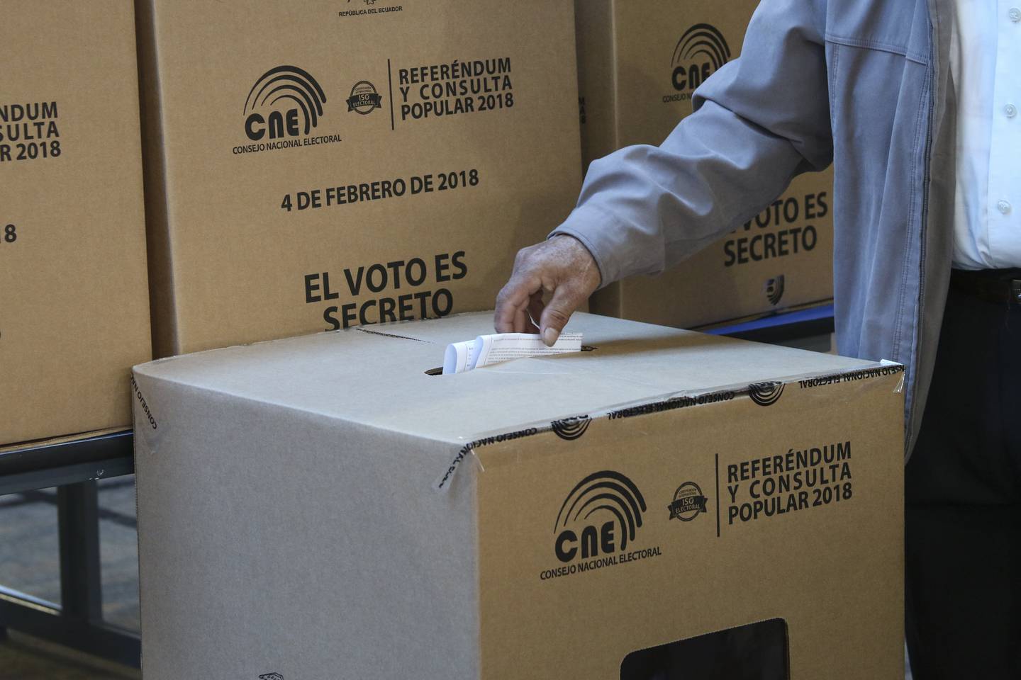 Voting in a 2018 referendum in Ecuador