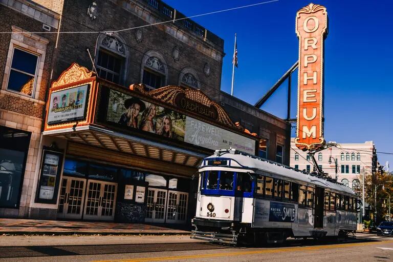 A trolley passes in front of the Orpheum Theater in downtown Memphis, Tennessee.dfd