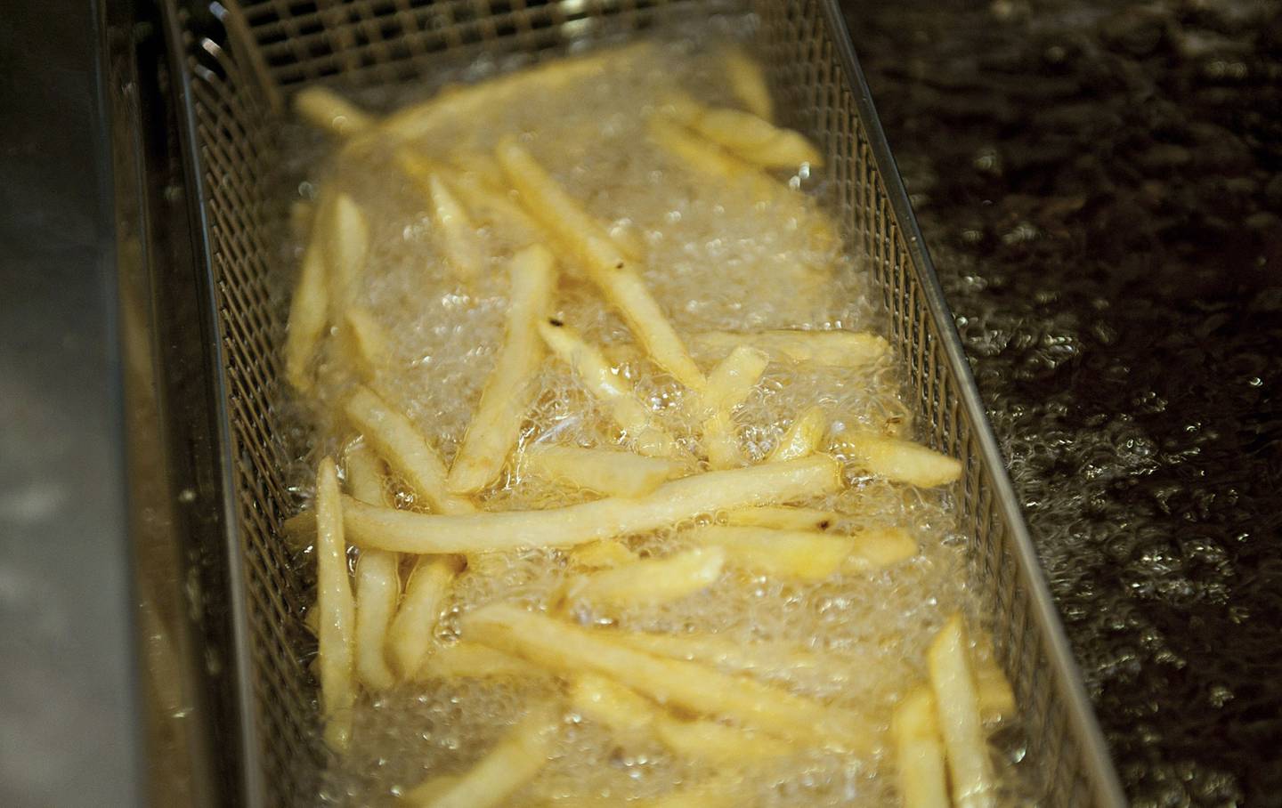 French fries are cooked during a quality evaluation at McDonald's Corp. headquarters in Oak Brook, Illinois, U.S.