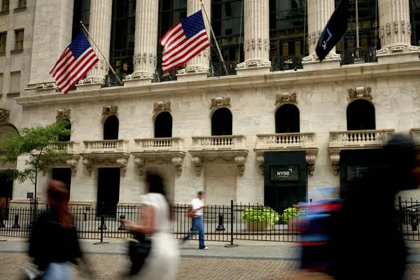 Pedestrians near the New York Stock Exchange (NYSE) in New York, US, on Monday, Aug. 28, 2023. Stocks advanced, while bond yields retreated at the start of a week jam-packed with economic reports that will help shape the outlook for Federal Reserve policy.