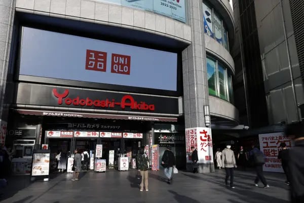 The Uniqlo logo displayed on a screen outside the Yodobashi Akiba Building in Tokyo, Japan, on Thursday, April 13, 2023