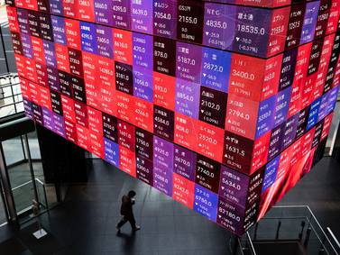 Acciones asiáticas siguen tendencia de Wall Street y esperan discurso de Powelldfd