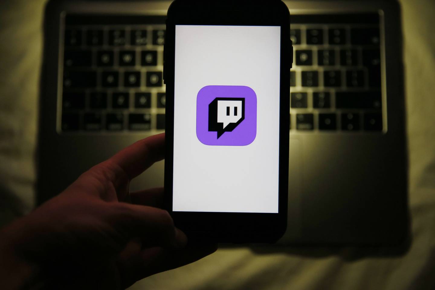 A smartphone displays a logo for the Twitch streaming app, operated by Amazon.com Inc., in this arranged photograph in London, U.K., on Thursday, Sept. 17, 2020.