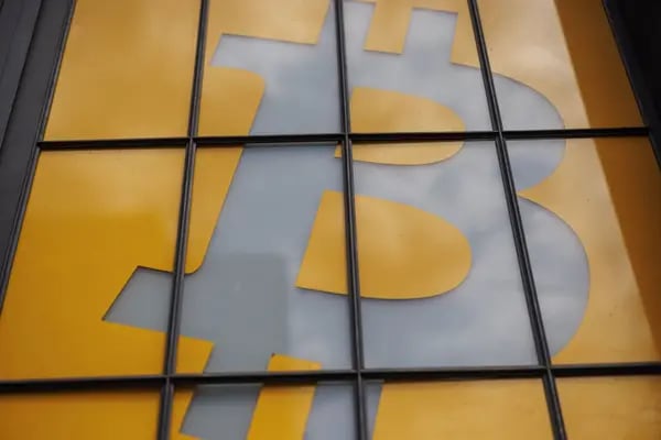 A Bitcoin logo on the doors of the venue of the Paralelni Polis project, an organisation combining art, social sciences and modern technology, in Prague, Czech Republic, on Tuesday, May 17, 2022. Photographer: Milan Jaros/Bloomberg