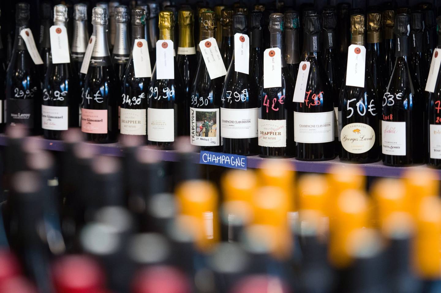 Bottles of champagne for sale at the La Cave Le Verre Vole wine store in Paris, France, on Thursday, Jan. 20, 2022. After plunging in 2020, sales of champagne jumped last year to a record 5.5 billion euros ($6.24 billion), according to the Comite Champagne (CIVC). Photographer: Nathan Laine/Bloomberg