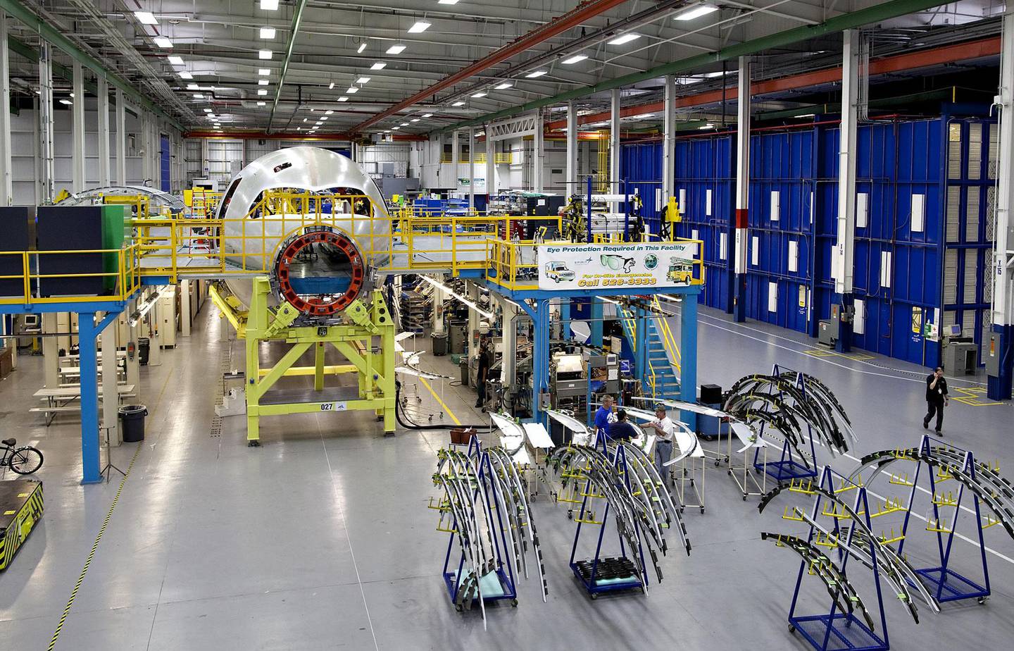 A Boeing 787 composite forward fuselage section sits on the factory floor at Spirit AeroSystems in Wichita, Kansas.