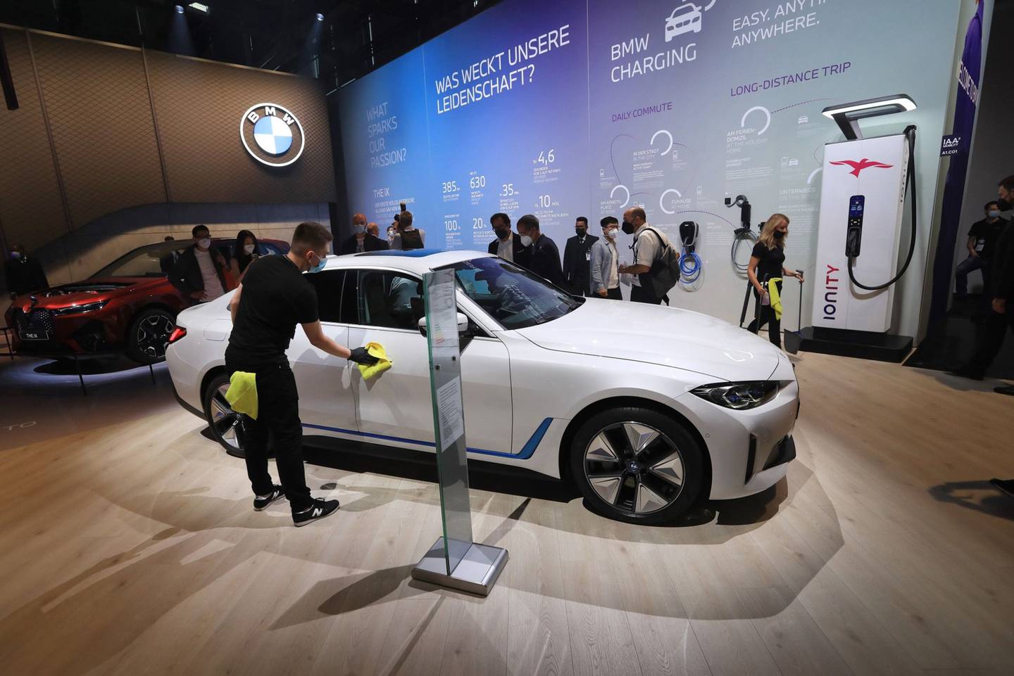 The BMW i4 sedan is like an electrified BMW 4 Series vehicle, with an estimated 300-mile range and a starting price of just over $55,000. BMW is offering two variant choices: an i4 eDrive40 (335 horsepower, zero to 60 mph in 5.7 seconds, rear-wheel drive, and a range of up to 300 miles) and an i4 M50 (536 horsepower, zero to 60 mph in 3.9 seconds, all-wheel drive, and range up to 240 miles). Deliveries are expected to begin in the first part of 2022. Photographer: Krisztian Bocsi/Bloombergdfd