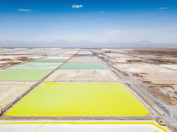 Brine pools at a Sociedad Quimica y Minera de Chile (SQM) lithium mine on the Atacama salt flat in the Atacama Desert, Chile, on Wednesday, March 13, 2024. After a spectacular bust, battery-metal lithium is showing tentative signs of life on speculation the retracement that convulsed the market last year has forced the conditions for a recovery.