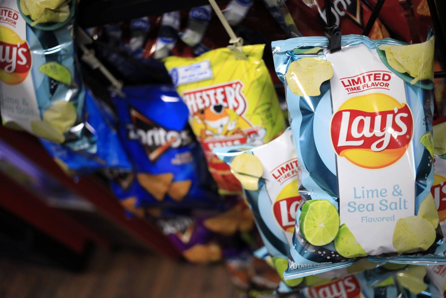 Bags of PepsiCo Inc. brand Lay's potato chips for sale at a grocery store in Bagdad, Kentucky, U.S., on Friday, April 9, 2021. PepsiCo Inc. is scheduledto release earnings figures on April 15.
