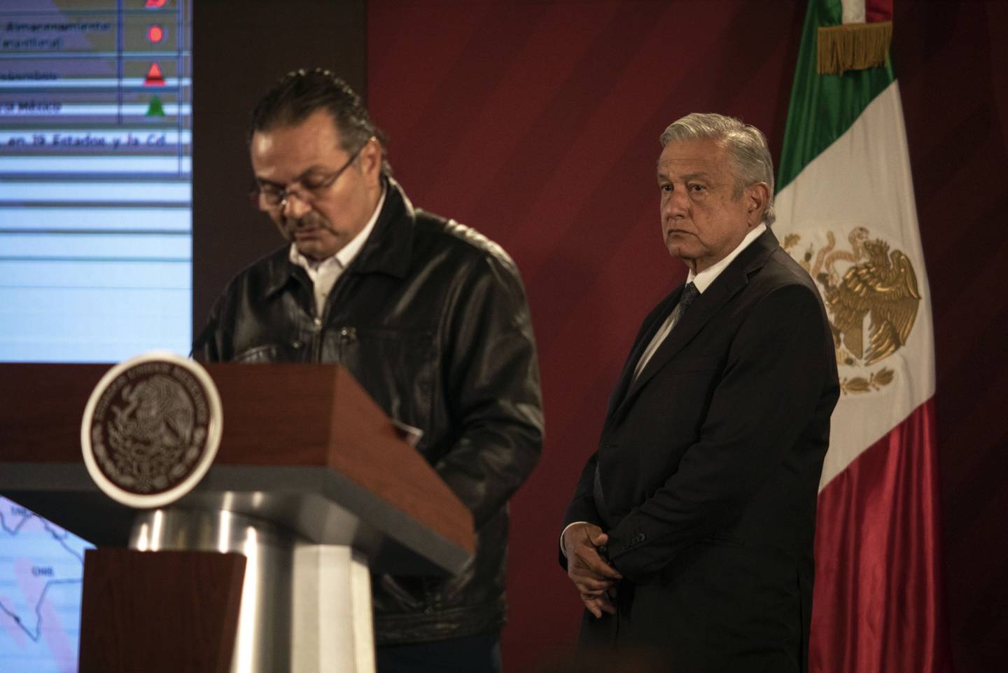 Andres Manuel Lopez Obrador, Mexico's president, listens while Octavio Romero Oropeza, chief executive officer of Petroleos Mexicanos (Pemex), left, speaks during a news conference at the National Palace in Mexico City, Mexico.