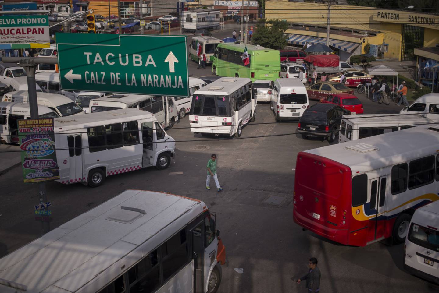 Buses gather at the Cuatro Caminos Metro station in Mexico City, Mexico, on Wednesday, Sept. 9, 2015. Mexico City has the second-largest metro system in North America after New York, with 12 lines and 195 stations serving a population of 20.1 million people in the metropolitan area. Photographer: Christian Rodriguez/Bloombergdfd