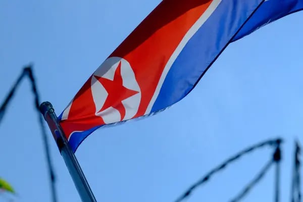 A North Korean flag flies at the Embassy of North Korea compound in Kuala Lumpur, Malaysia, on Saturday, March 20, 2021. Kim Jong Uns regime cut off diplomatic relations with Malaysia, accusing it of a super-large hostile act after its top court ruled a North Korean man can be extradited to the U.S. face money-laundering charges. Photographer: Samsul Said/Bloomberg