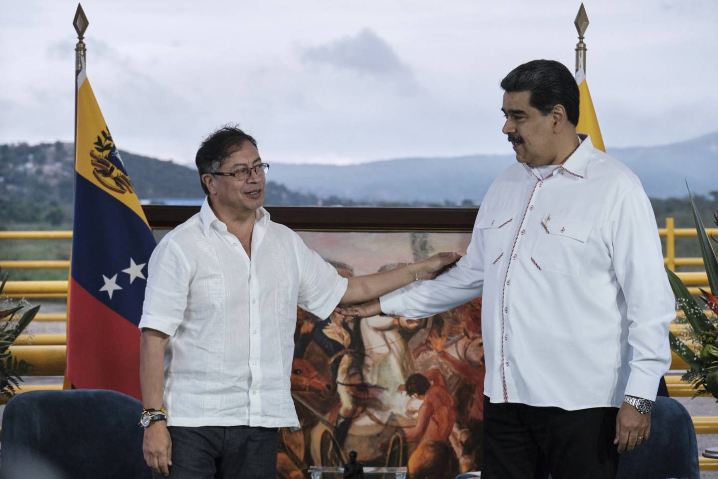 Gustavo Petro, Colombia's president, left, and Nicolas Maduro, Venezuela's president, meet at the Tienditas International Bridge in Cucuta, Colombia, on Thursday, Feb. 16, 2023.