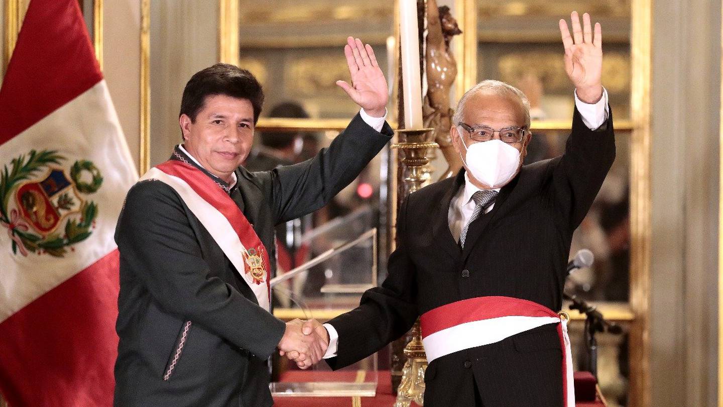 Peru's President Pedro Castillo with his new cabinet chief, Aníbal Torres (right).dfd