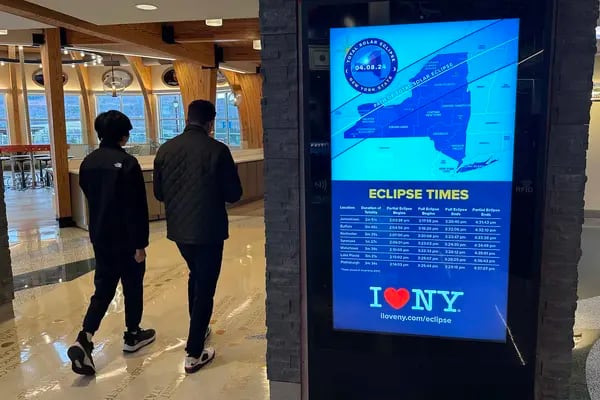 A sign informs people of upcoming solar eclipse totality times at a rest stop on Interstate 81 in Kirkwood, New York, on Thursday, April 4, 2024. The highway leads to areas of the state that are in the path of totality. If clouds don't get in the way, viewers in the path wearing eclipse glasses will see the moon begin to slowly cover the sun until it is completely blocked, a period of darkness called totality, during which temperatures drop and the sun's corona will be visible. (AP Photo/Ted Shaffrey)