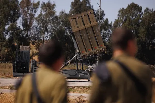 Israeli soldiers at an Iron Dome anti-missile battery site near the Gaza border in southern Israel, on Wednesday, April 17, 2024. Irans unprecedented attack on Saturday night, lasting no more than several hours, came with a steep price tag, and points to the sheer expense of air anti-missile as nations such as Iran improve their drone and missile capabilities. Photographer: Kobi Wolf/Bloomberg