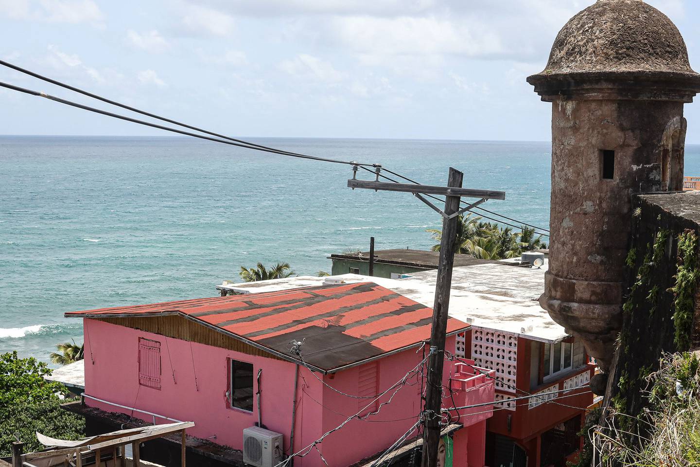 Utility poles in the La Perla neighborhood of San Juan, Puerto Rico.