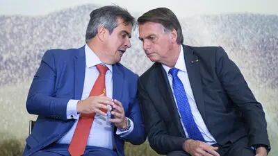 Jair Bolsonaro, Brazil's president, speaks to Ciro Nogueira, Brazil's chief of staff.