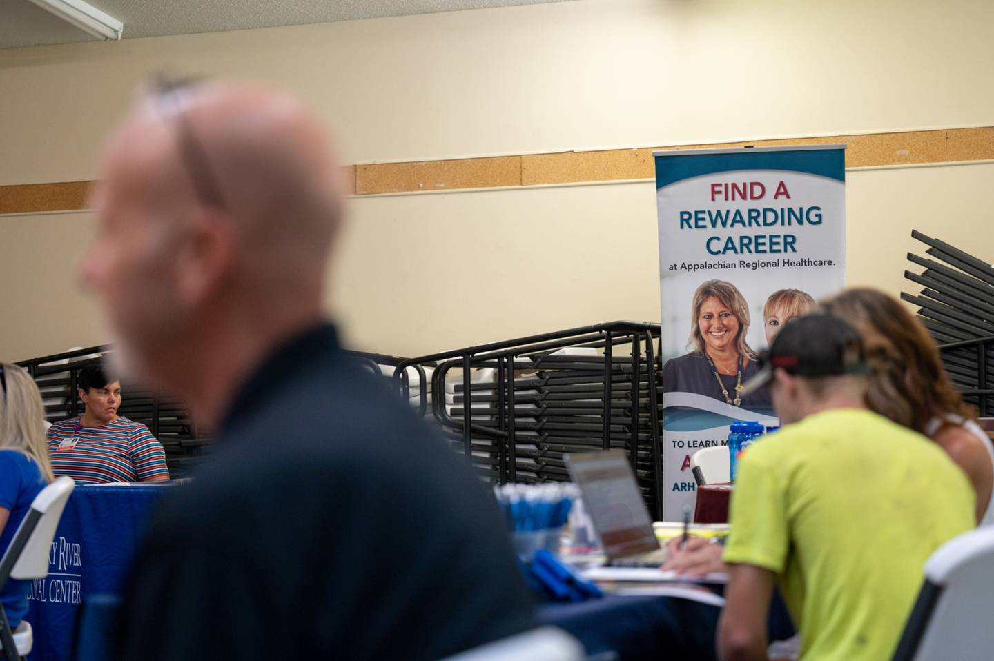 Appalachian Regional Healthcare signage seeking job applications during a job fair at a community center in Beattyville, Kentucky, U.S., on Wednesday, July 28, 2021.