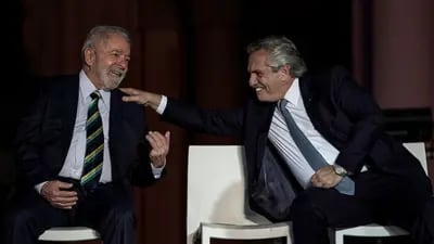Luiz Inacio Lula da Silva and Alberto Fernandez, smile during a Day of Democracy and Human Rights event in Buenos Aires, Argentina, on Friday, Dec. 10, 2021.