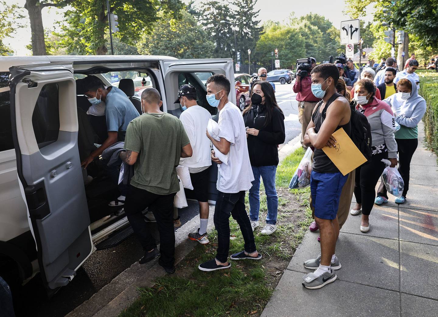 Migrants after being dropped off near the residence of Vice President Harris in Washington, D.C. on Sept. 15.