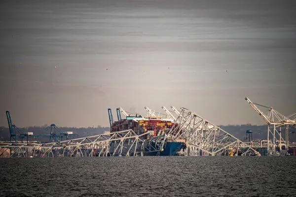 The Dali container vessel after striking the Francis Scott Key Bridge that collapsed into the Patapsco River in Baltimore, Maryland, US, on Tuesday, March 26, 2024. The commuter bridge collapsed after being struck by a container ship, causing vehicles to plunge into the water and halting shipping traffic at one of the most important ports on the US East Coast. Photographer: Al Drago/Bloomberg