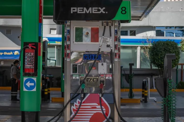A fuel pump at a Petroleos Mexicanos (Pemex) gas station in Mexico City, Mexico, on Thursday, March 10, 2022. Gasoline, diesel and electricity prices in Mexico will not increase beyond inflation despite the turmoil in global energy markets caused by Russia's invasion of Ukraine, said Mexican President Andres Manuel Lopez Obrador as reported by Natural Gas Intelligence.dfd