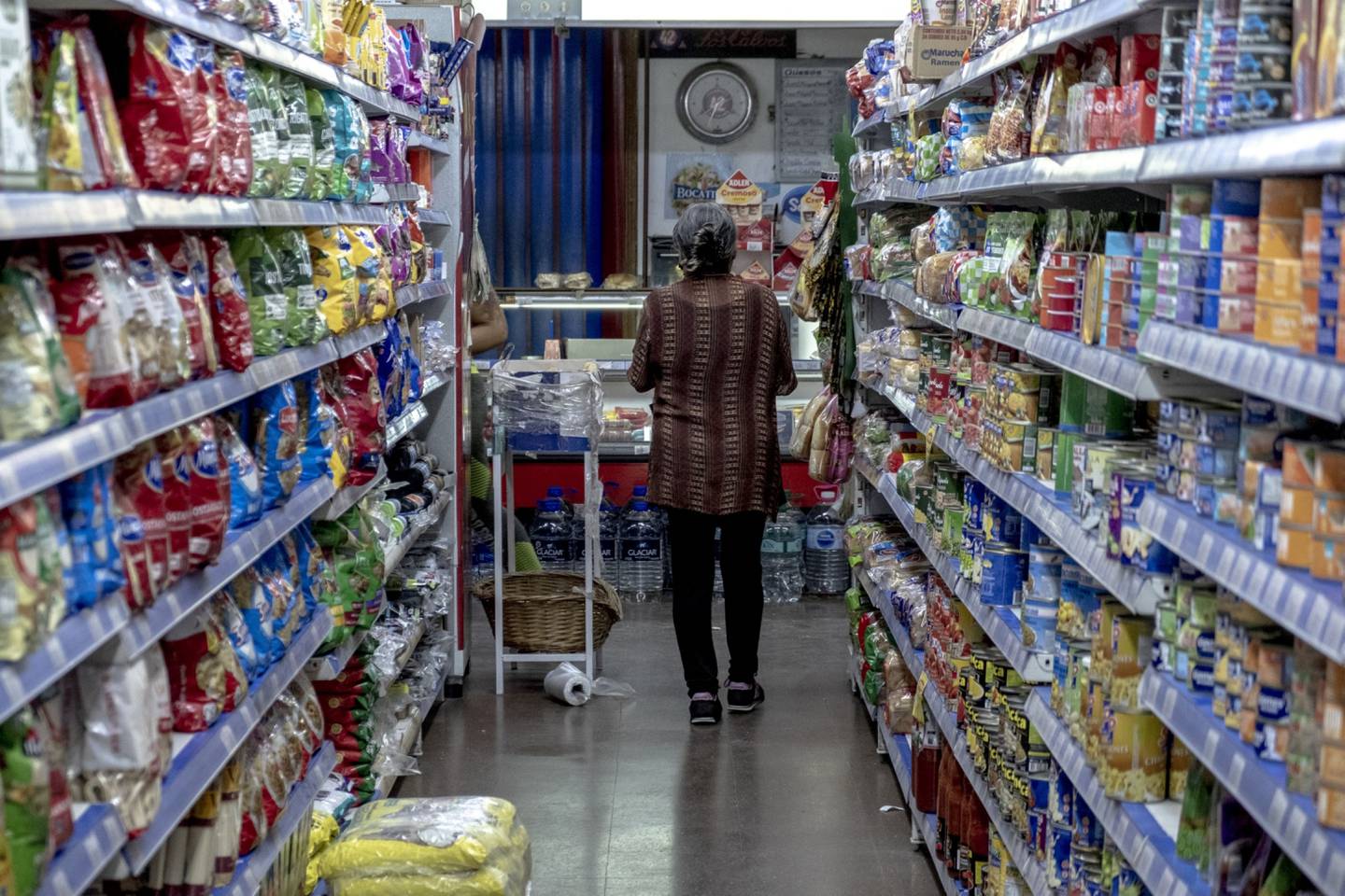 A customer shops at a supermarket in Buenos Aires, Argentina.