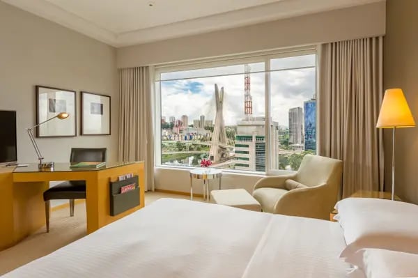 Room at hotel Grand Hyatt Sao Paulo, Brazil, with a view to suspended bridge above Pinheiros River