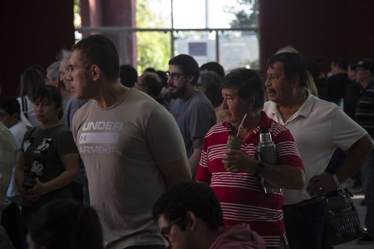 Voters wait in line to cast ballots at a polling station during presidential elections in Lambare, Paraguay, on Sunday, April 30, 2023.dfd