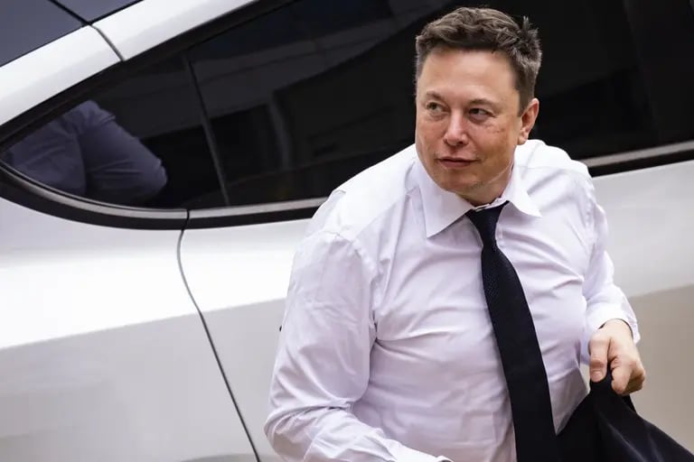 Elon Musk, chief executive officer of Tesla Inc., arrives at court during the SolarCity trial in Wilmington, Delaware, U.S., on Tuesday, July 13, 2021. Musk was cool but combative as he testified in a Delaware courtroom that Tesla's more than $2 billion acquisition of SolarCity in 2016 wasn't a bailout of the struggling solar provider. Photographer: Samuel Corum/Bloombergdfd