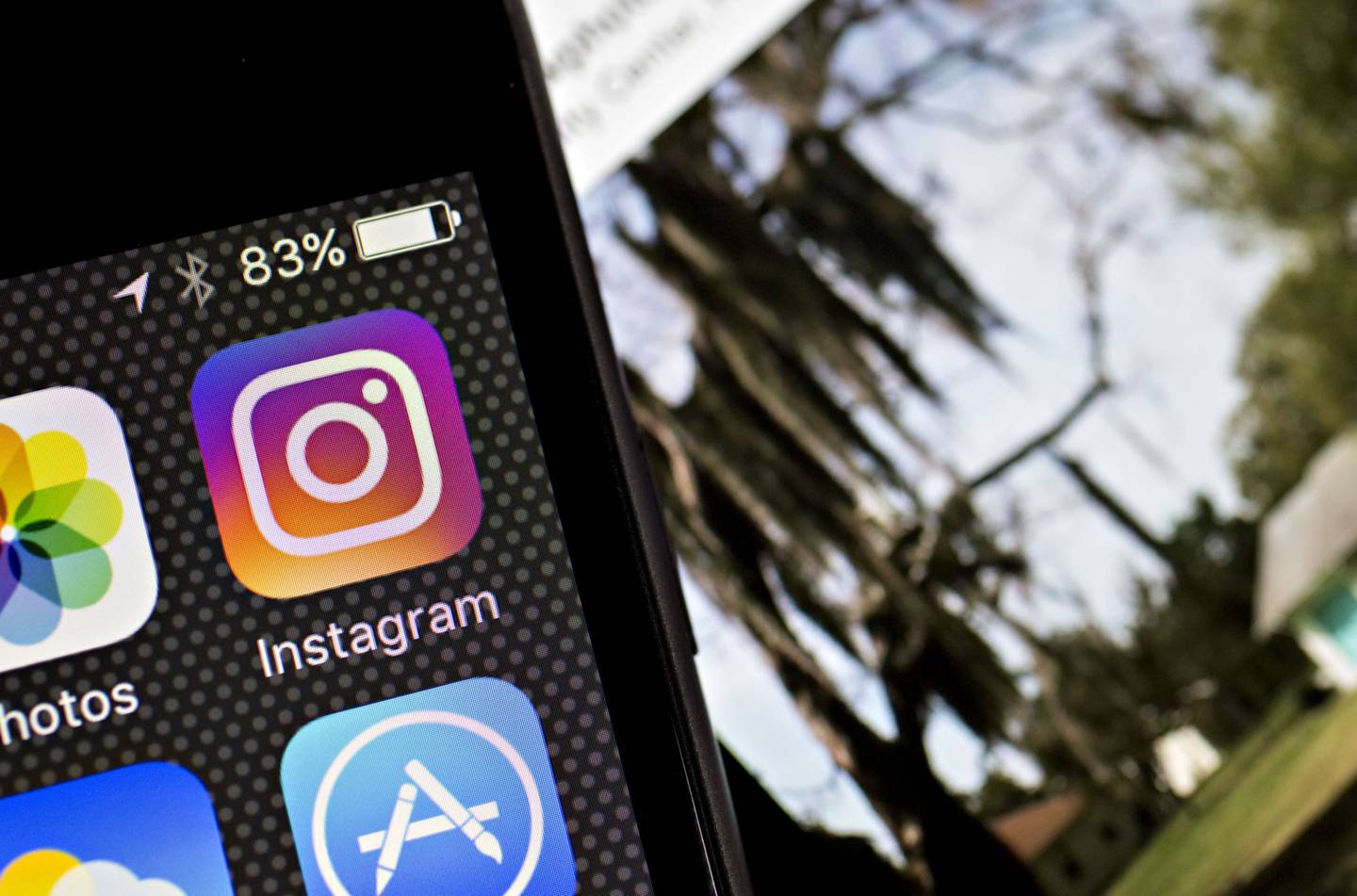 Facebook Inc.'s Instagram logo is displayed on an Apple Inc. iPhone in this arranged photograph taken in Washington, D.C., U.S., on Friday, June 17, 2016. In a bid to give its users an incentive to create more content for the photo and video-sharing site, Facebook's Instagram is considering sharing revenue generated from news, sports, celebrities and other content said Carolyn Everson, vice president for global marketing solutions at Facebook. Photographer: Andrew Harrer/Bloomberg