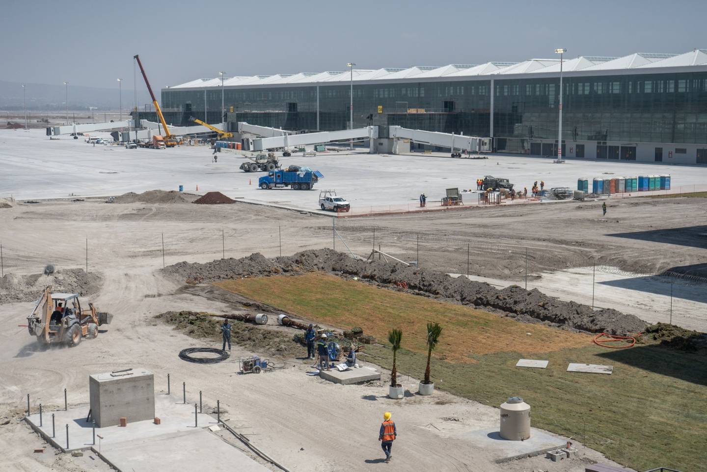 Contractors work at Felipe Angeles International Airport (AIFA) while under construction in Zumpango, Mexico, on Sunday, March 13, 2022.  Felipe Angeles International Airport is expected to open on March 21.dfd