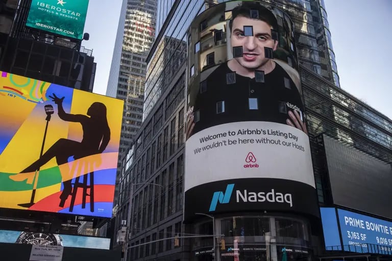 Brian Chesky, cofounder and CEO of Airbnb Inc, speaks virtually during the IPO o the company at the Nasdaq MarketSite in New York, o December 10, 2020. dfd