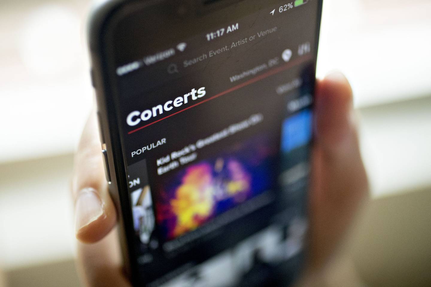 The Live Nation Entertainment Inc. application is displayed for a photograph on an Apple Inc. iPhone in Washington, D.C., U.S.