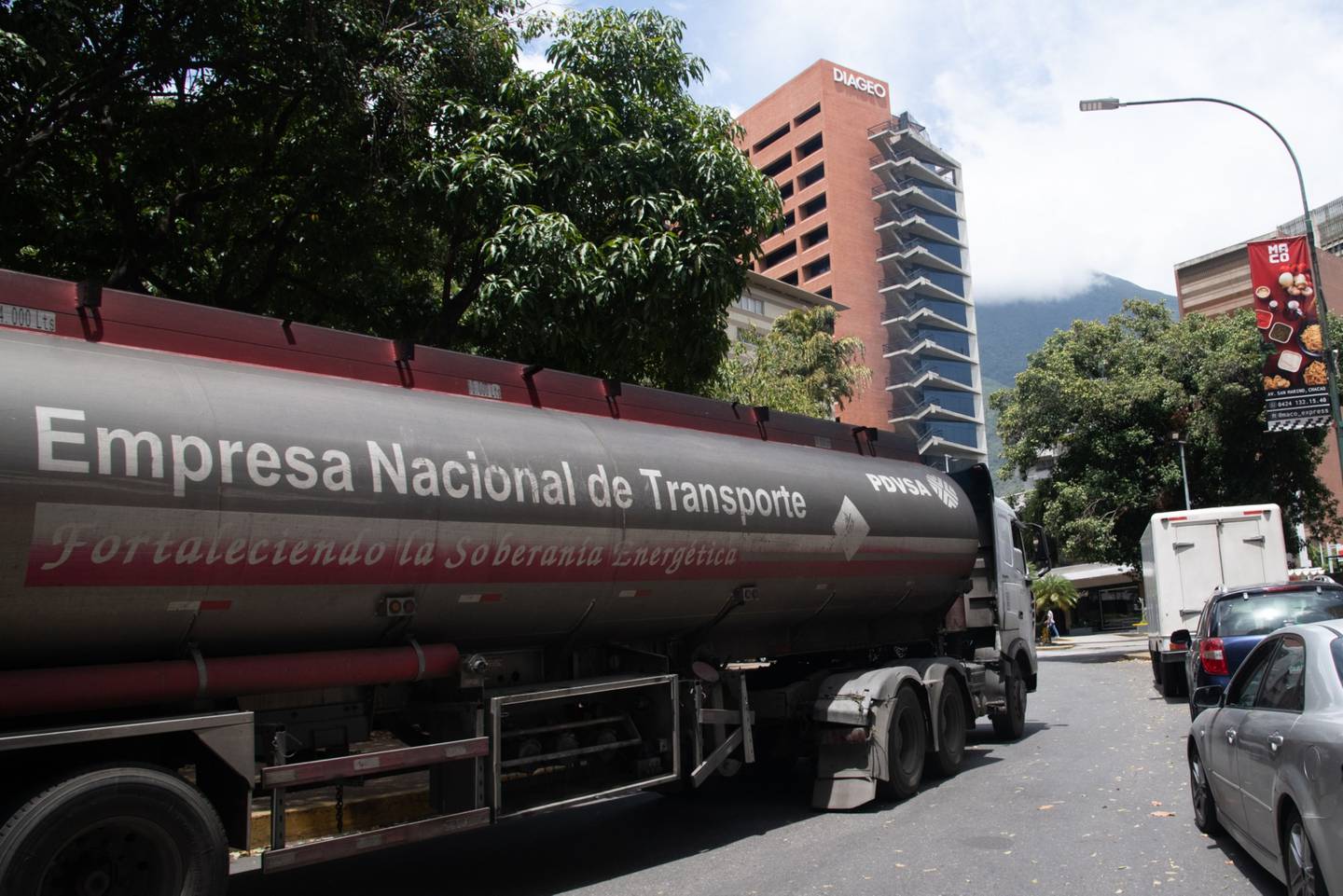 A PDVSA fuel truck drives through the La Castellana neighborhood of Caracas. Photographer: Carolina Cabral Fernandez/Bloomberg